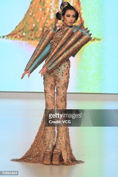 Model showcases designs by Guo Pei on the catwalk as part of the Hong Kong Fashion Week Fall/Winter 2010 on January 18, 2010 in Hong Kong, China.