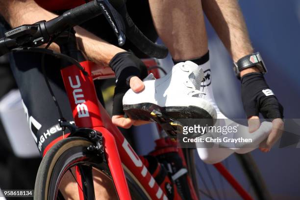 Brent Bookwalter of The United States and BMC Racing Team adjusts his sock and shoe prior to the start of stage two of the 13th Amgen Tour of...
