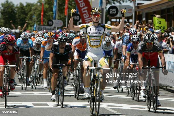Andre Greipel of Germany riding for Team HTC Columbia celebrates after winning Stage 1 of the 2010 Tour Down Under on January 19, 2010 in Adelaide,...
