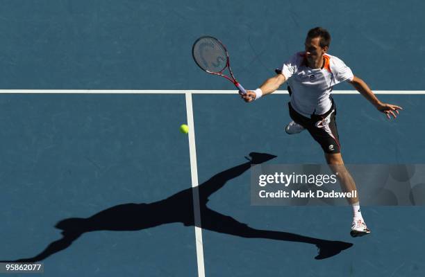 Sergiy Stakhovsky of the Ukraine serves in his first round match against Jo-Wilfried Tsonga of France during day two of the 2010 Australian Open at...