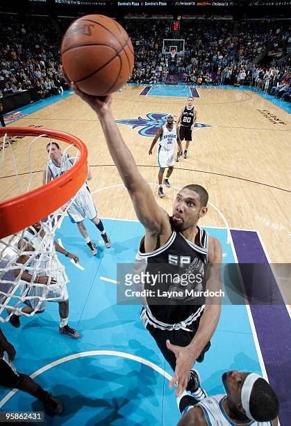Tim Duncan of the San Antonio Spurs shoots over the New Orleans Hornets on January 18, 2010 at the New Orleans Arena in New Orleans, Louisiana. NOTE...