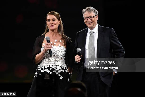 Melinda Gates and Bill Gates speak on stage during The Robin Hood Foundation's 2018 benefit at Jacob Javitz Center on May 14, 2018 in New York City.