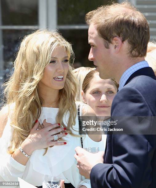 Prince William chats to pop singer Delta Goodrem while lunching at Admiralty House on January 19, 2010 in Sydney, Australia. HRH flew to Sydney today...