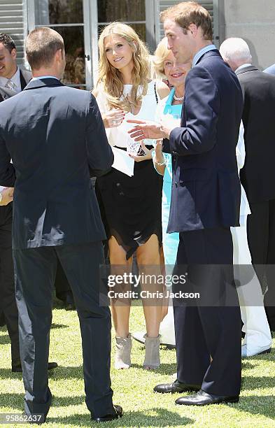 Prince William chats with pop singer Delta Goodrem while lunching at Admiralty House on January 19, 2010 in Sydney, Australia. HRH flew to Sydney...