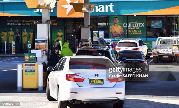 Australia's Socceroos key sponsor Caltex displays veteran Tim Cahill's picture as new advertising campaign at the company's petrol station in Sydney...
