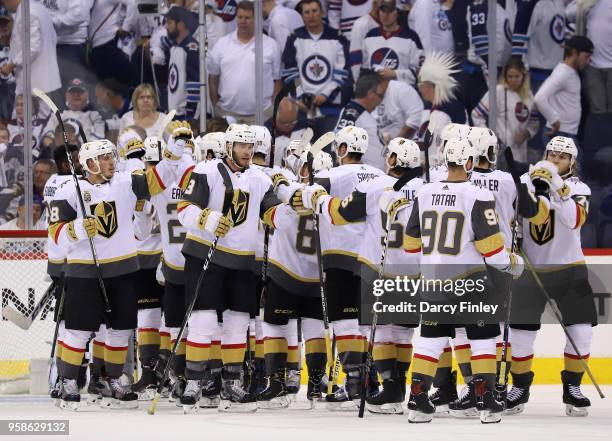 Vegas Golden Knights players celebrate following a 3-1 victory over the Winnipeg Jets in Game Two of the Western Conference Final during the 2018 NHL...