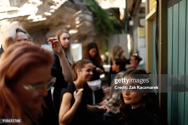 Model prepares backstage ahead of the Matchesfashion.com x Emilia Wickstead show at Mercedes-Benz Fashion Week Resort 19 Collections at Wylie's Baths...