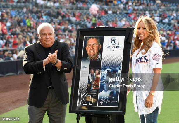 Kelley Towers, wife of former San Diego Padres general manager Kevin Towers, stands with Ron Fowler, Padres' executive chairman, in a pre-game...