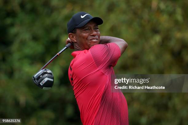 Tiger Woods of the United States hits driver off the 11th tee during the final round of THE PLAYERS Championship on the Stadium Course at TPC...