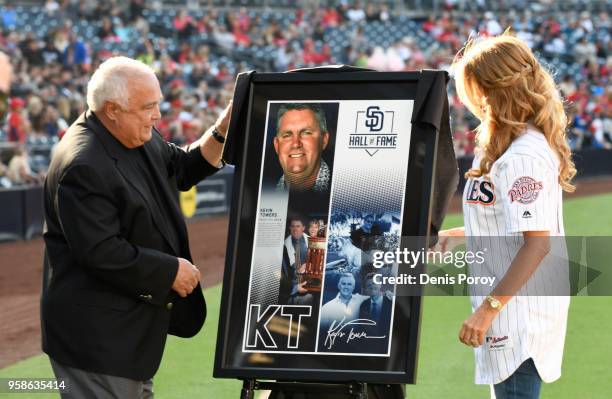 Kelley Towers, wife of former San Diego Padres general manager Kevin Towers, stands with Ron Fowler, Padres' executive chairman, in a pre-game...