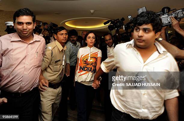 Owner of 'Mumbai Indians' cricket team Neeta Ambani arrives for a press conference after the Indian Premier League auction in Mumbai on January 19,...