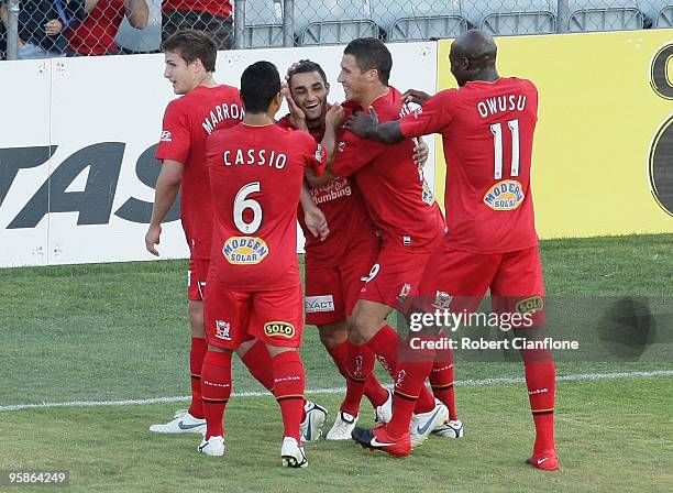 Lucas Pantelis of Adelaide United celebrates his goal with teammates during the round 19 A-League match between Adelaide United and Perth Glory at...