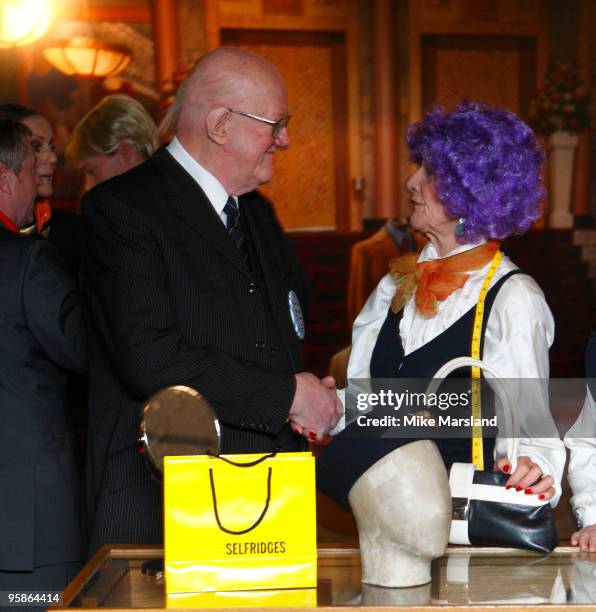 Nicholas Smith and June Brown attend 'You Are Being Served' - a Charity sale of designer clothing, shoes and accessories owned by the late Wendy...