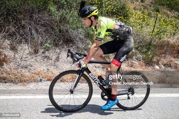 Brendan Rhim of The United States and Team Holowesko-Citadel p/b Arapahoe Resources holds his shoulder after a crash during stage 2 of the Amgen Tour...