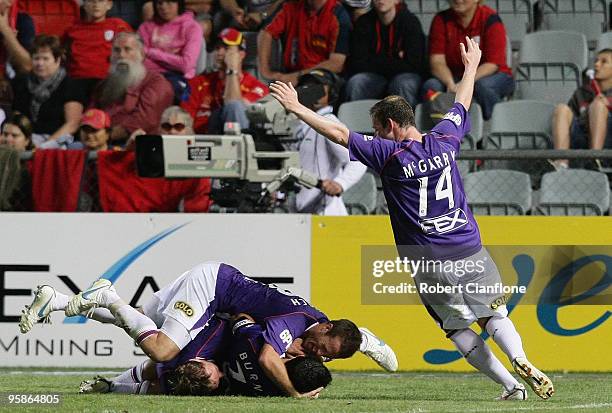 Perth Glory players celebrate a goal during the round 19 A-League match between Adelaide United and Perth Glory at Hindmarsh Stadium on January 19,...