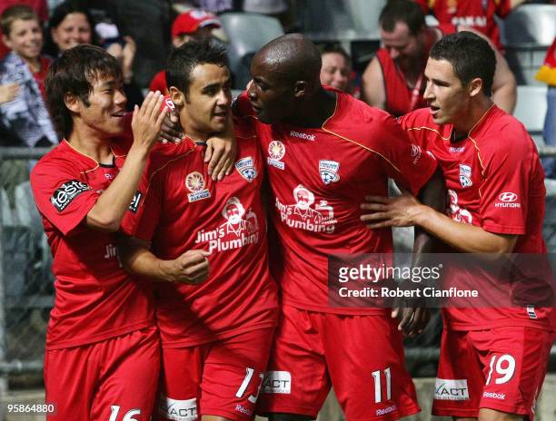 Travis Dodd of Adelaide United celebrates his goal with Inseob Shin , Lloyd Owusu and Matthew Leckie during the round 19 A-League match between...