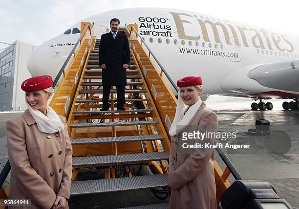 Adel Al Redha , executive vice president Emirates engineering and operations, pose in front of the aircraft during the hand over of the A380 to the...
