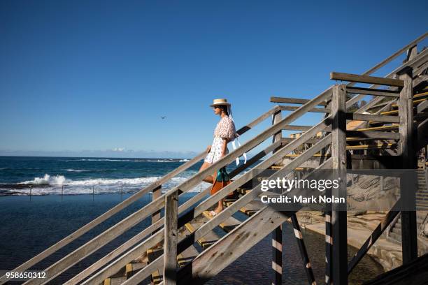 Model walks the runway during the Matchesfashion.com x Emilia Wickstead show at Mercedes-Benz Fashion Week Resort 19 Collections at Wylie's Baths on...