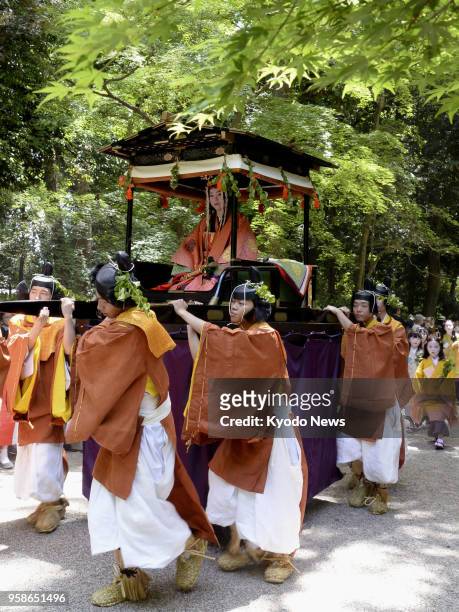 Float carrying Shiho Sakashita, a 23-year-old office worker playing the role of the "Saio-dai" imperial princess in the annual Aoi festival in Kyoto,...