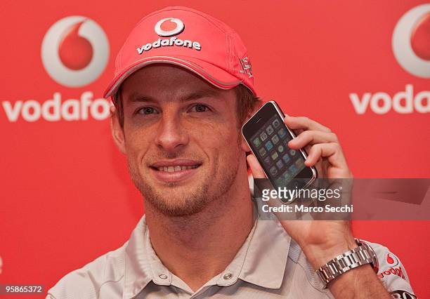 Jenson Button attends a photocall to launch iPhone availablity on Vodafone on January 19, 2010 in London, England.