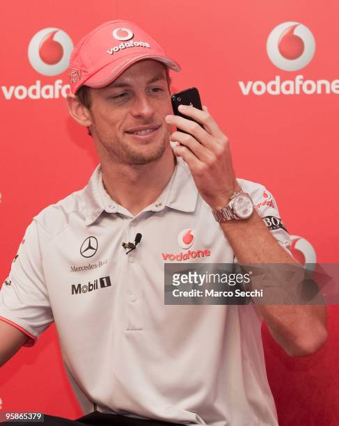 Jenson Button attends a photocall to launch iPhone availablity on Vodafone on January 19, 2010 in London, England.