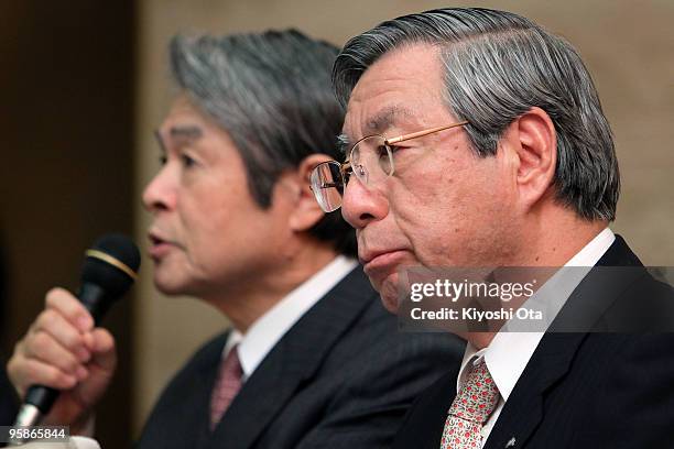 Haruka Nishimatsu , President and CEO of Japan Airlines Corp. , listens while Hiroshige Nishizawa , President of Enterprise Turnaround Initiative...