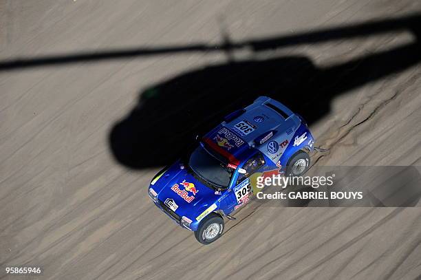 Mark Miller steers his Volkswagen during the 13th stage of the Dakar 2010, between San Rafael and Santa Rosa, Argentina on January 15, 2010. France's...