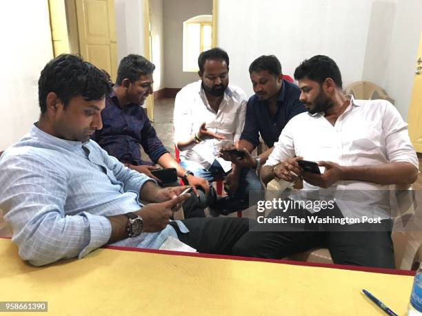 Members of the Bharatiya Janata Party social media team and others at election headquarters in Mangalore, India. From left, Vikas Puttur, Prakash...