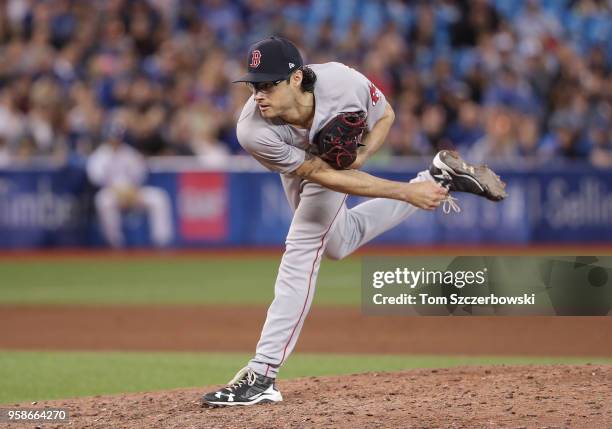 Joe Kelly of the Boston Red Sox delivers a pitch in the eighth inning during MLB game action against the Toronto Blue Jays at Rogers Centre on May...