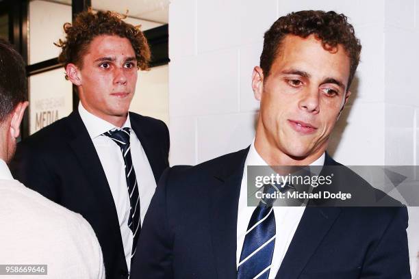 Charlie Curnow and brother Ed Curnow of the Carlton Blues leave after their AFL Tribunal Hearing into intentional contact with an umpire at AFL House...