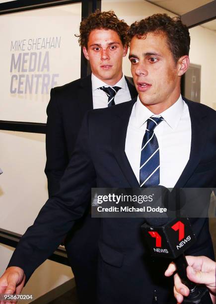 Charlie Curnow and brother Ed Curnow of the Carlton Blues leave after their AFL Tribunal Hearing into intentional contact with an umpire at AFL House...