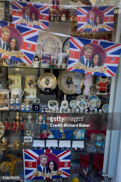 Royal family souvenirs and merchandise on sale in a tourist gift shop window as the royal town of Windsor gets ready for the royal wedding between...
