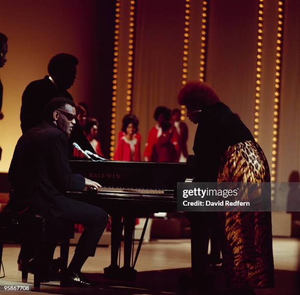 American soul singers Ray Charles and Aretha Franklin on stage together during recording of the 'Duke Ellington...We Love You Madly' tribute show at...