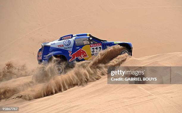 Brazil's Mauricio Jose Neves steers his Volkswagen during the 4th stage of the Dakar 2010 between Fiambala, Argentina, and Copiapo, Chile on January...