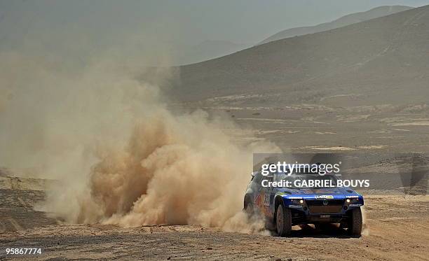 Spain's Carlos Sainz steers his Volkswagen during the 5th stage of the Dakar 2010 between Copiapo and Antofagasta, Chile, on January 6, 2010. US Mark...