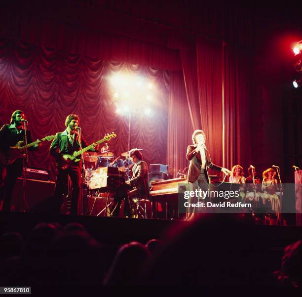 Singer Frankie Valli performs on stage with the Four Seasons in the 1970's.