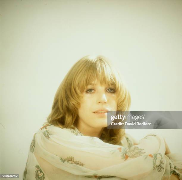 Singer Marianne Faithfull poses in a dress by Ossie Clark in 1973.