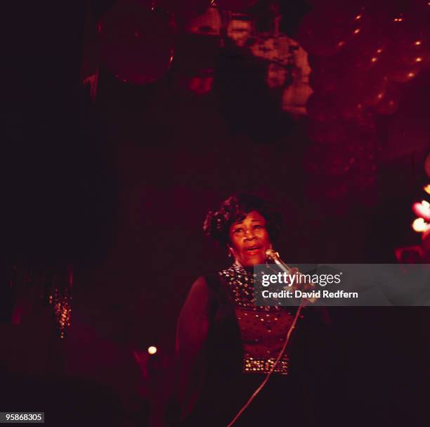 American jazz singer Ella Fitzgerald performs live on stage during a concert performance at Annabel's club in London in 1971.