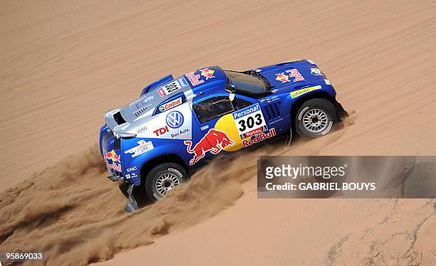 Spain's Carlos Sainz steers his Volkswagen during the 9th stage of the Dakar 2010, between Copiapo and La Serena, Chile, on January 11, 2010. Qatar�s...