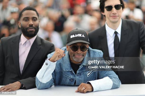 Actor John David Washington, US director Spike Lee and US actor Adam Driver pose on May 15, 2018 during a photocall for the film "BlacKkKlansman" at...