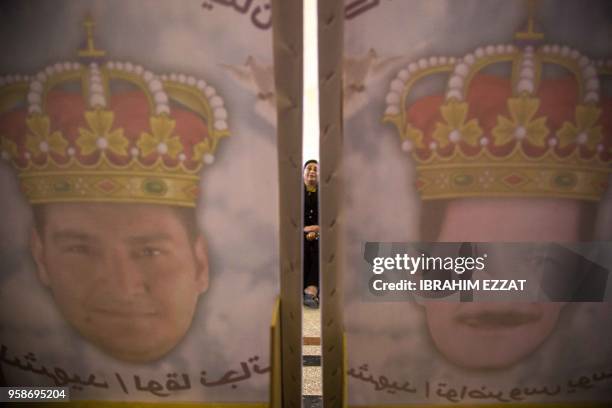 Relative mourns during the funereal ceremony of 20 Egyptian Coptic Christian men who were beheaded by jihadists loyal to the Islamic State group on...