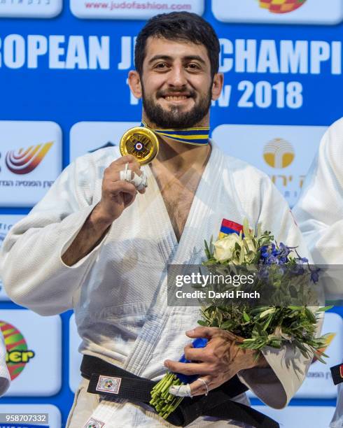 Under 73kg gold medallist, Ferdinand Karapetian of Armenia proudly shows his medal during day two of the 2018 Tel Aviv European Judo Championships at...