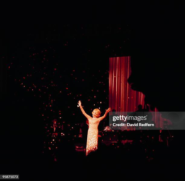 Singer Marlene Dietrich performs on stage in 1975.