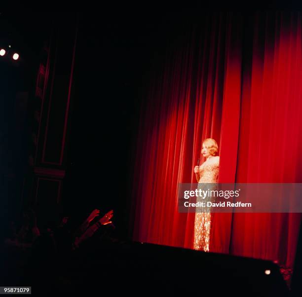 Singer Marlene Dietrich performs on stage in 1975.