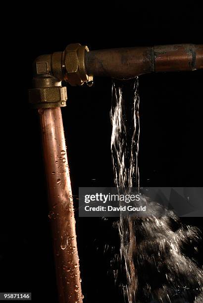 burst water pipes - burst pipes stock pictures, royalty-free photos & images