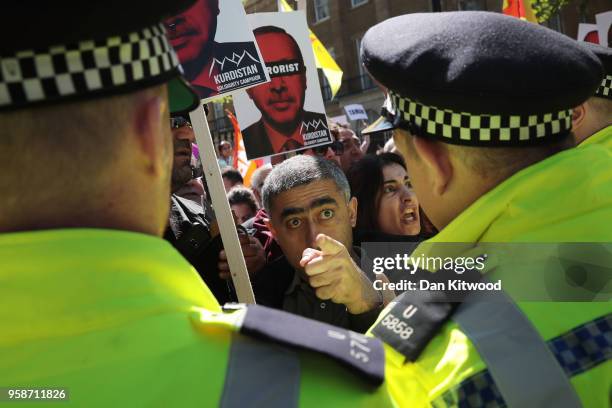 Anti-Erdogan protesters clash with police outside Downing Street as Turkish President Recep Tayyip Erdogan meets the Prime Minister, on May 15, 2018...