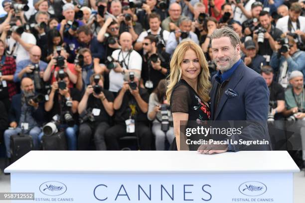 Kelly Preston and John Travolta attend the photocall for "Rendezvous With John Travolta - Gotti" during the 71st annual Cannes Film Festival at...