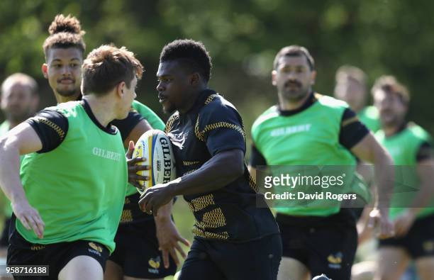 Christian Wade runs with the ball during the Wasps training session held at their training ground on May 15, 2018 in Coventry, England.