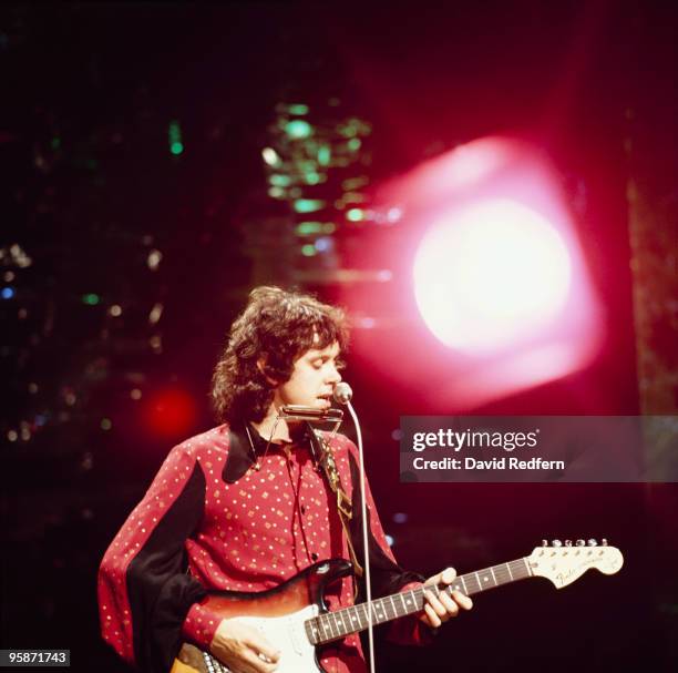 Scottish singer and musician Donovan plays a Fender Stratocaster guitar on a BBC television show in London in August 1972.