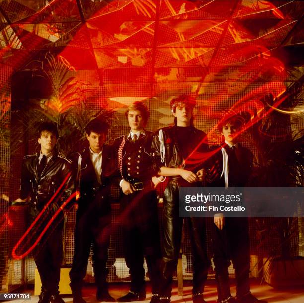 Posed group portrait of British band Duran Duran. Left to right are Andy Taylor, Roger Taylor, Simon Le Bon, John Taylor and Nick Rhodes in 1983.
